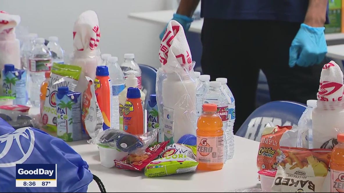 Group packs hydration kits for workers battling heat